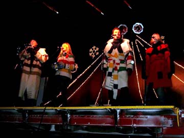 Tom Jackson, Beverley Mahood, Brad Johner, and Amanda Stott sing Christmas carols